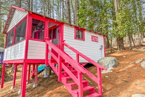 stairs that leads you to the main entrance of the cabin