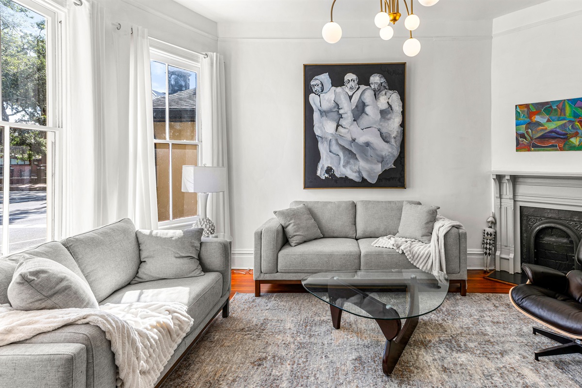 Living Room with Comfortable Seating and Original Art Work