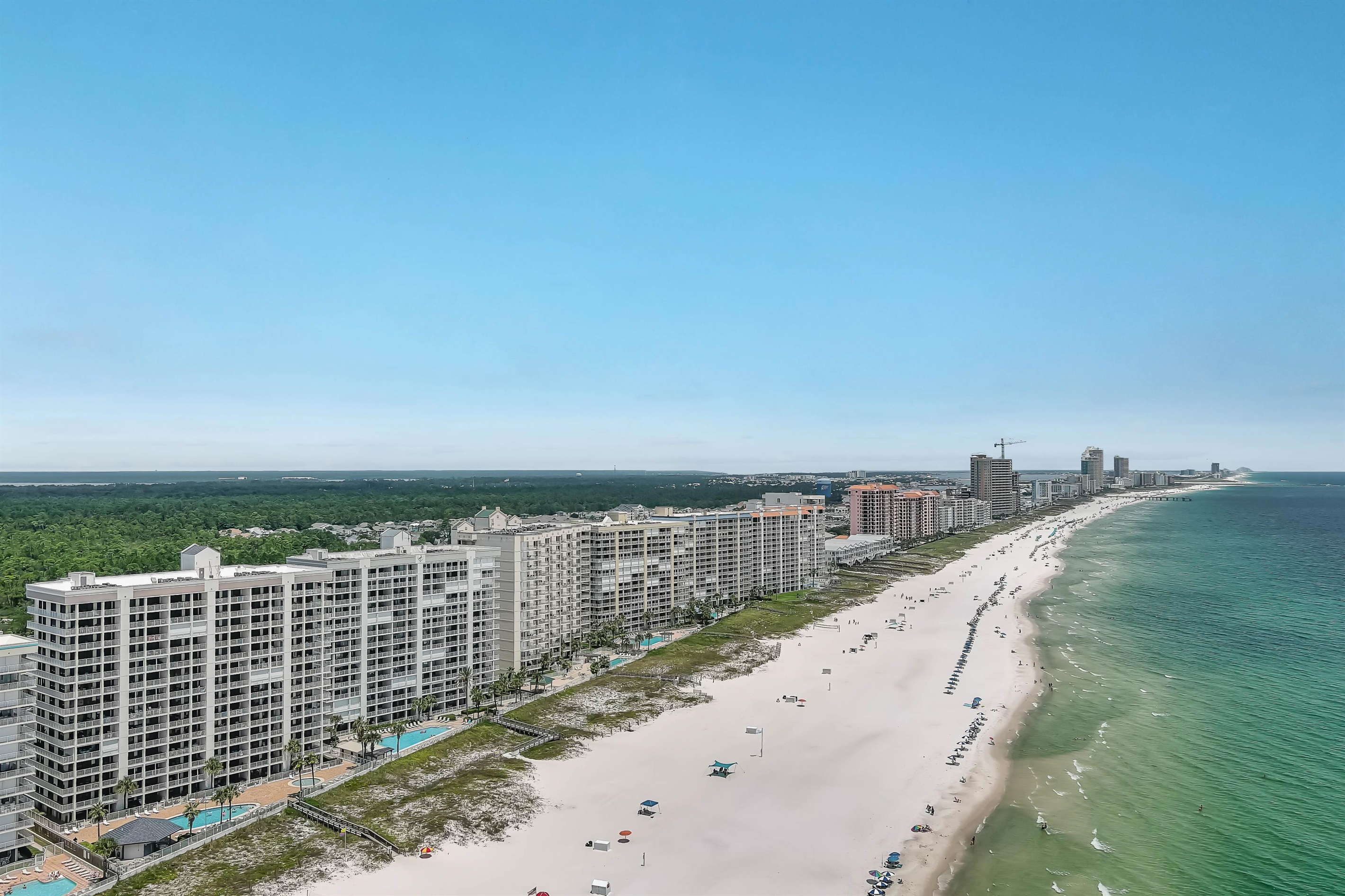 Endless horizons and white sand. We provide the view; you bring the memories.