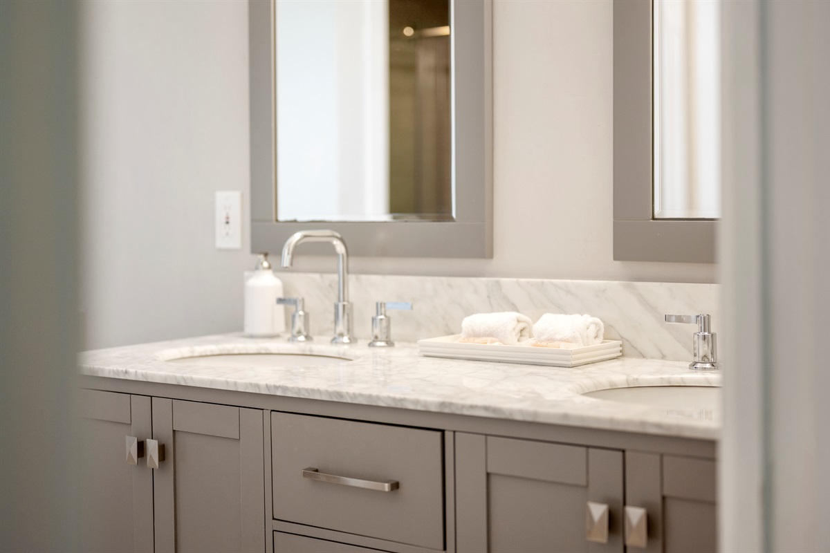 Refined touches include boutique organic soaps and modern spa accents