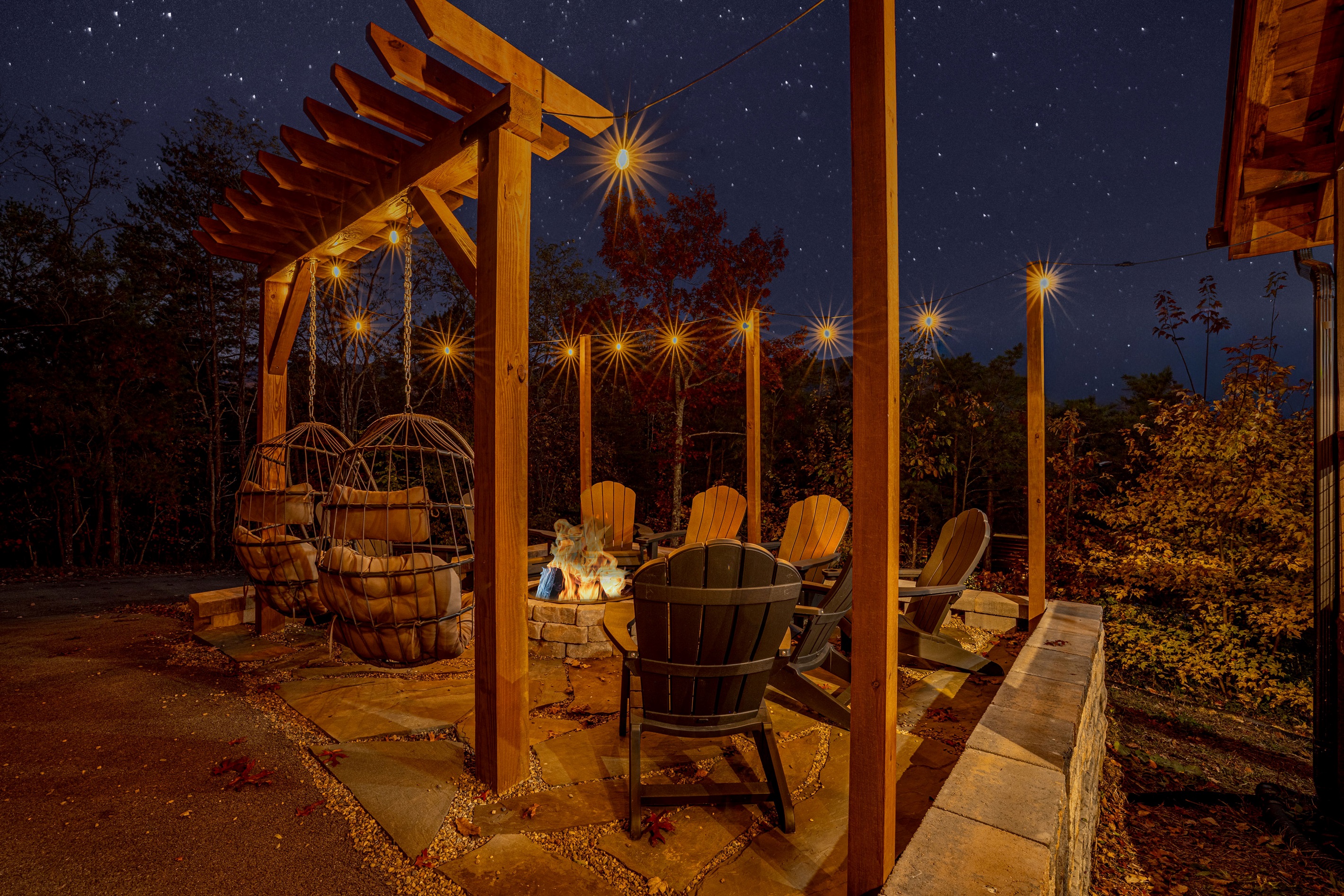 End your day by the fire pit under glowing string lights and starry skies.