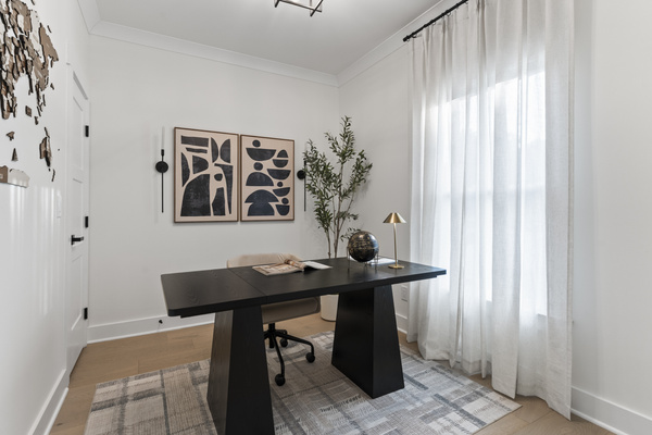Home office with large desk, comfortable chair and high speed internet.