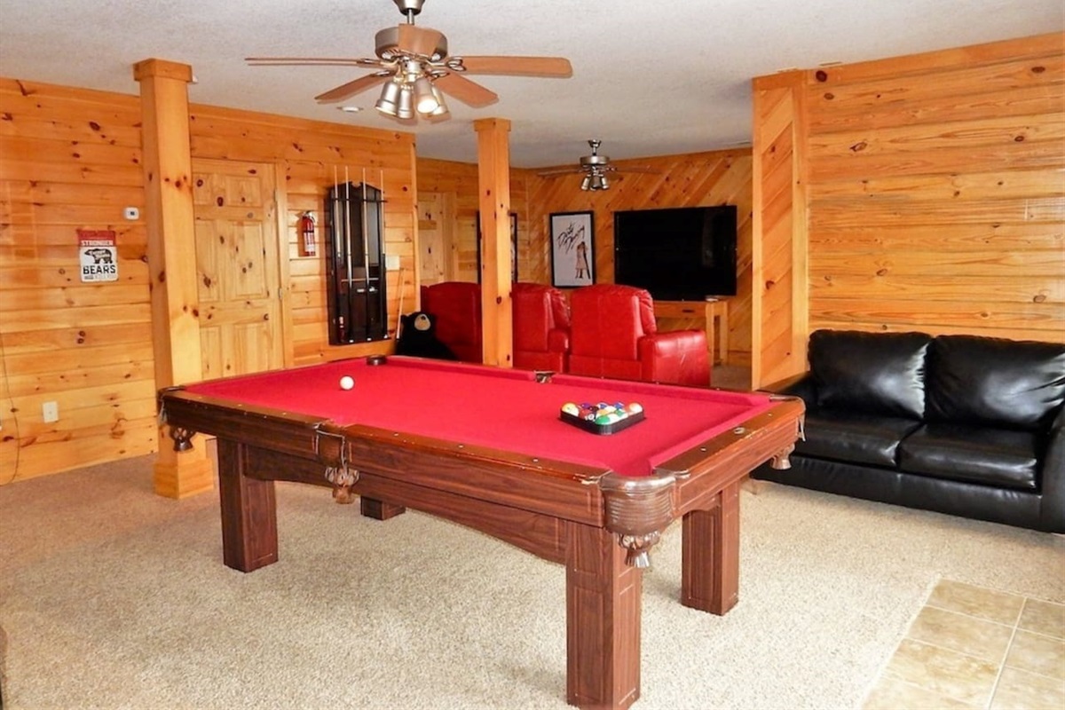Pool table and movie room with recliner seats! 