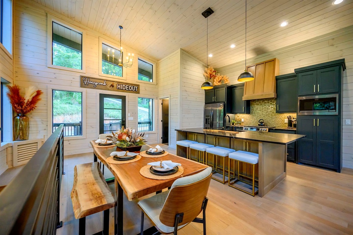 Gorgeous live edge Walnut dining table with matching benches provides seating for up to 8 people.