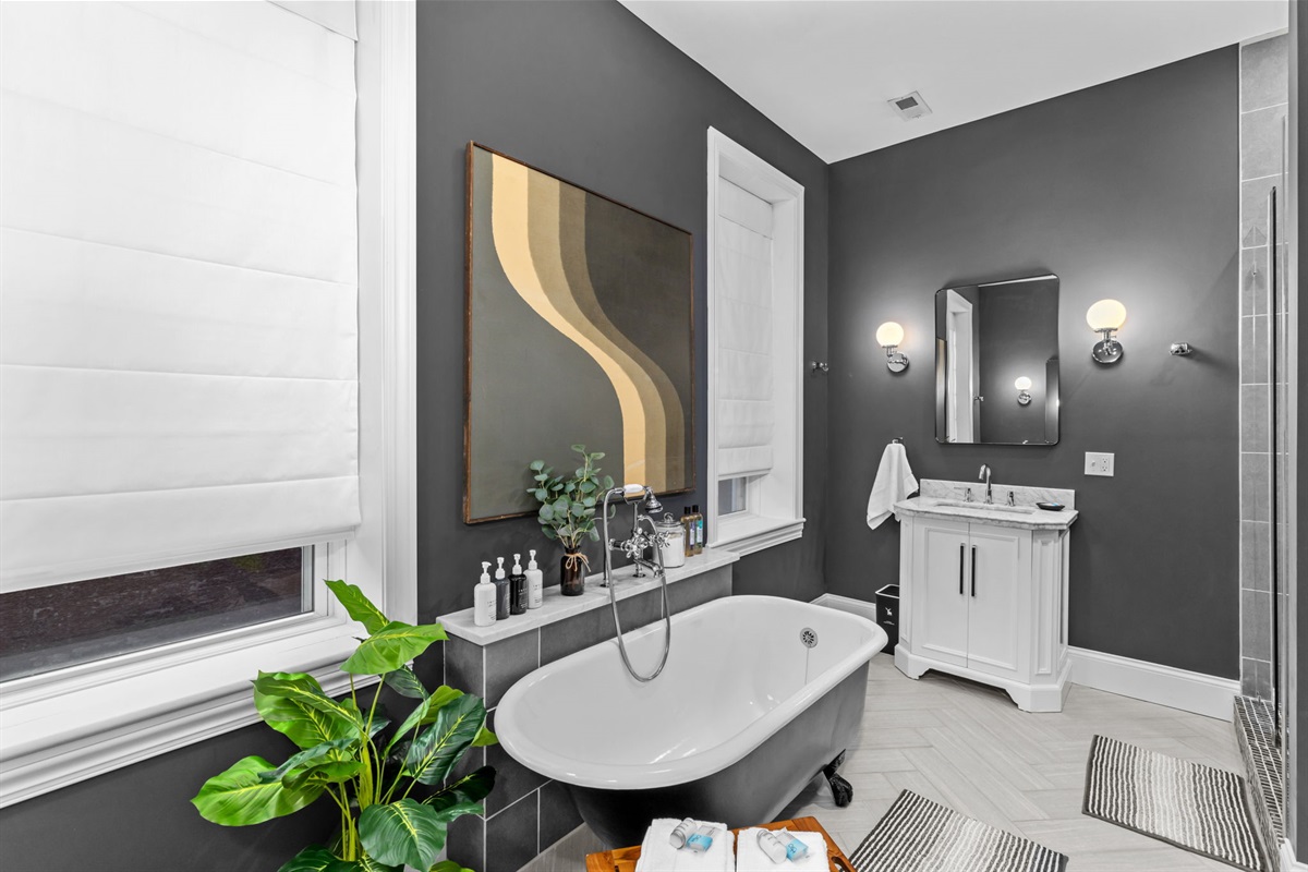 The master bath is equipped with two separate vanities so no need to fight over the space.