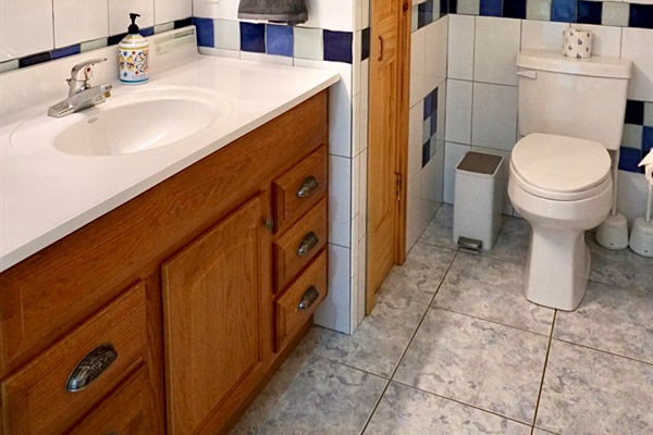 Bright tiles and elegant fixtures create a fresh space for relaxation and refreshment!