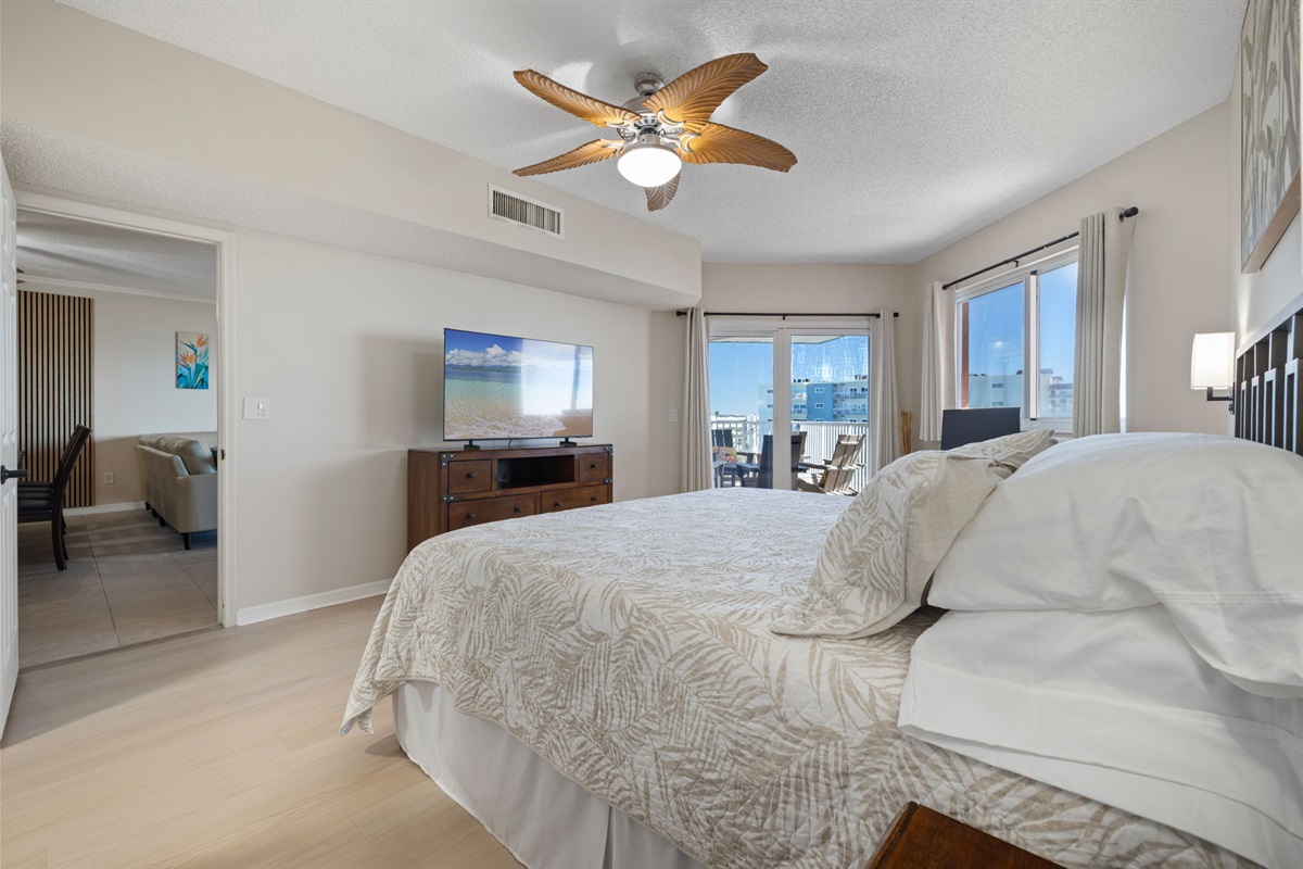 King size master bedroom with gulf views and patio access.