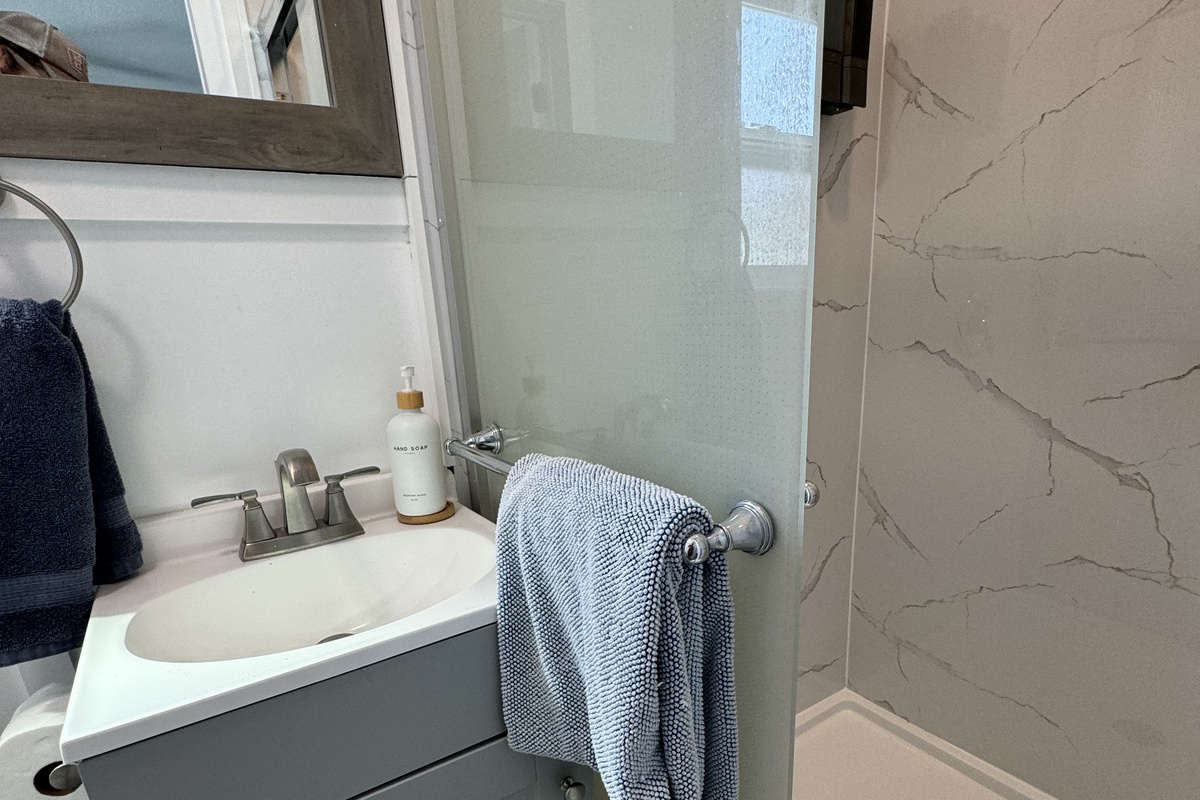 Pool-side bedroom with walk-in shower