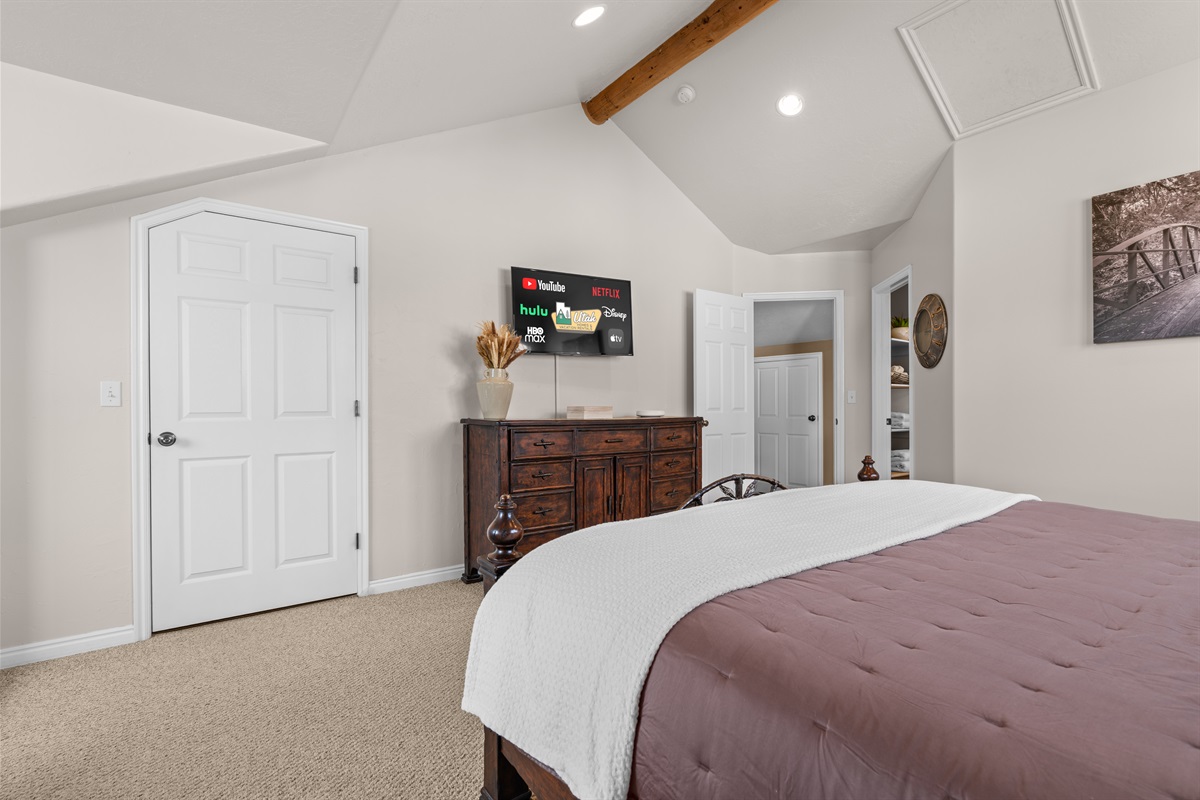 Bright, airy bedroom with classic lodge charm and peaceful vibes.