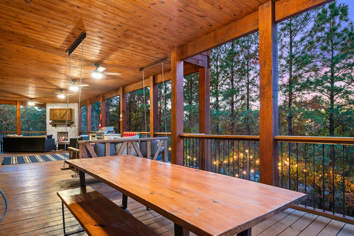 The outdoor dining area is ideal for meals with a view, offering seating for everyone to enjoy the fresh mountain air.