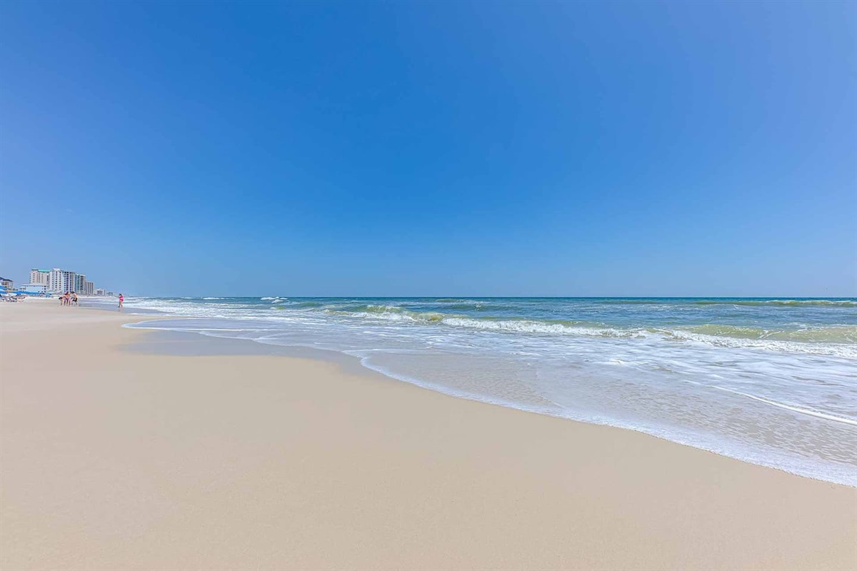 Beach Bliss: Stroll along the golden sands with breathtaking ocean views and endless sunshine! Just a 5 minute drive to white sandy beaches!