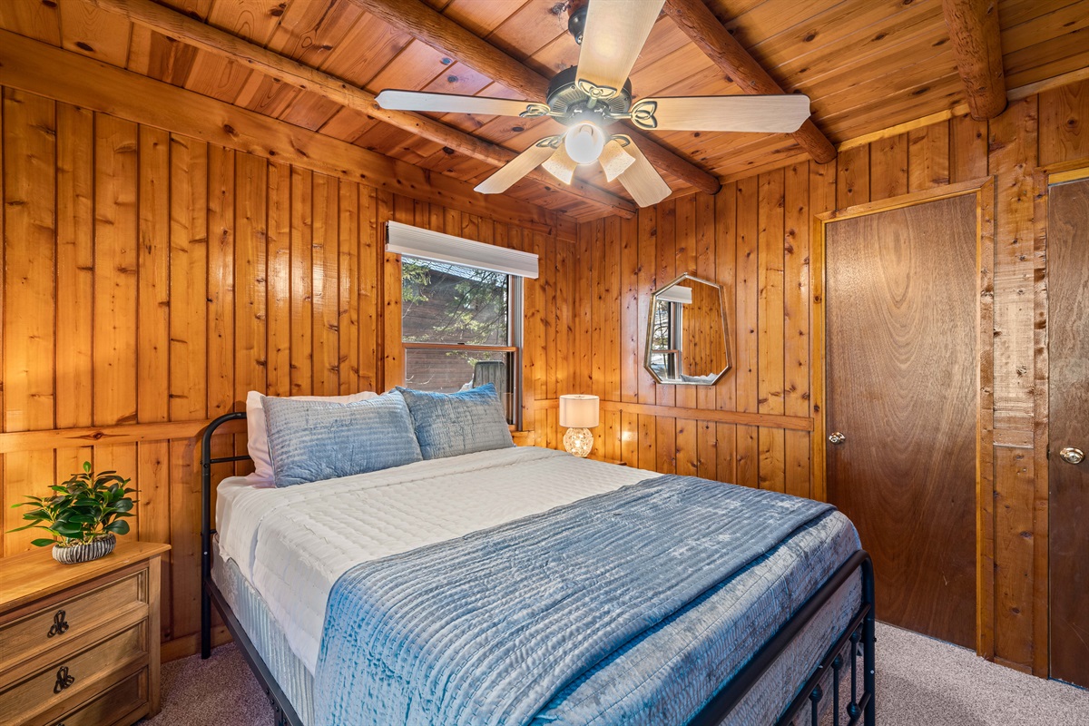 The second bedroom on the main floor has a queen bed and access to the jack-n-jill bathroom.