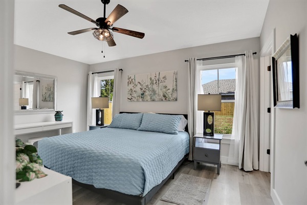 This bedroom in our home offers a king bed that will allow you sleep in optimal comfort.