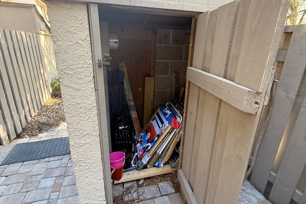 Patio storage with beach chairs and beach toys for guests