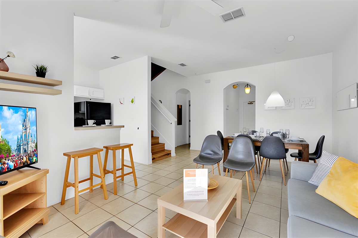 The open floorplan integrates the living and dining areas for you to enjoy family time during your stay.