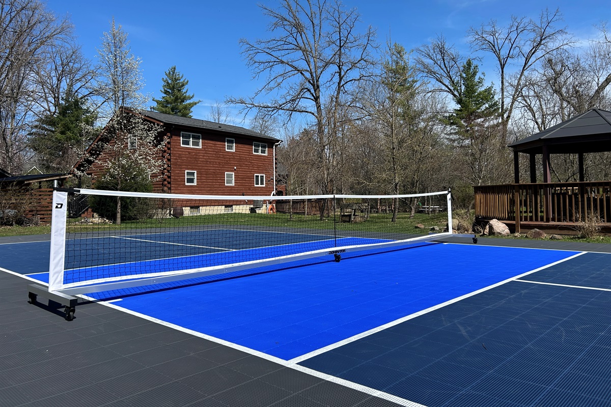 Regulation size pickleball court with Sport Court surface is only shared with guests who book the Guest Quarters.