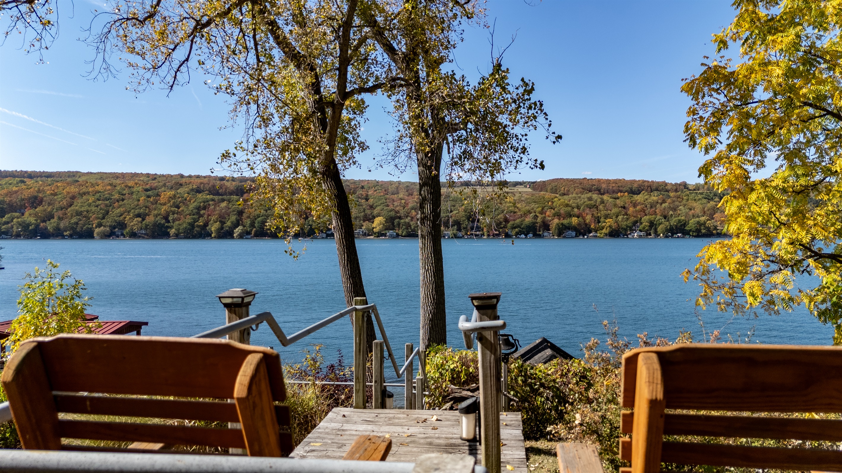 Unwind on the deck overlooking the sparkling lake — ideal for grilling, lounging, and soaking up Finger Lakes serenity.
