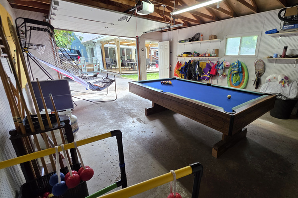 Game Room: Darts, Pool, Basketball Shooter, life jackets, outdoor games (badminton, Boche ball, lawn darts, cornhole, croquet, and more!). Not Temperature Controlled. 