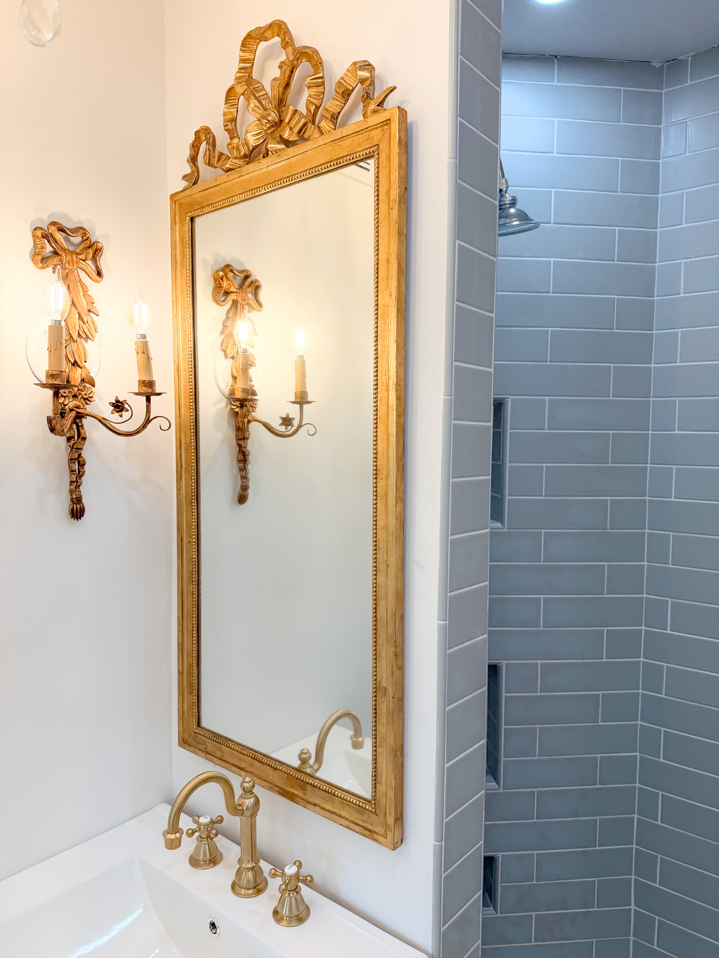 Elegant master bathroom with vintage charm and refined finishes.