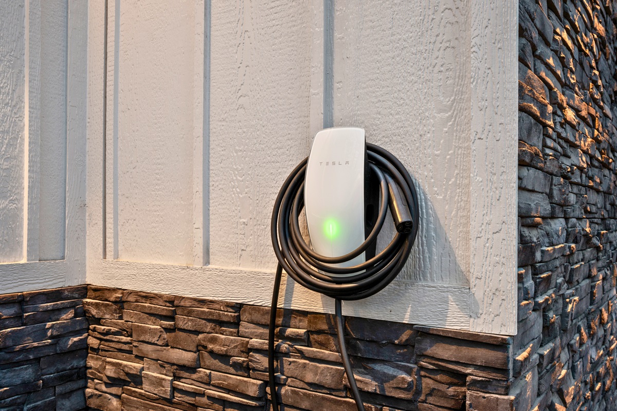 An EV charging station adds a convenient modern touch for guests traveling with electric vehicles.