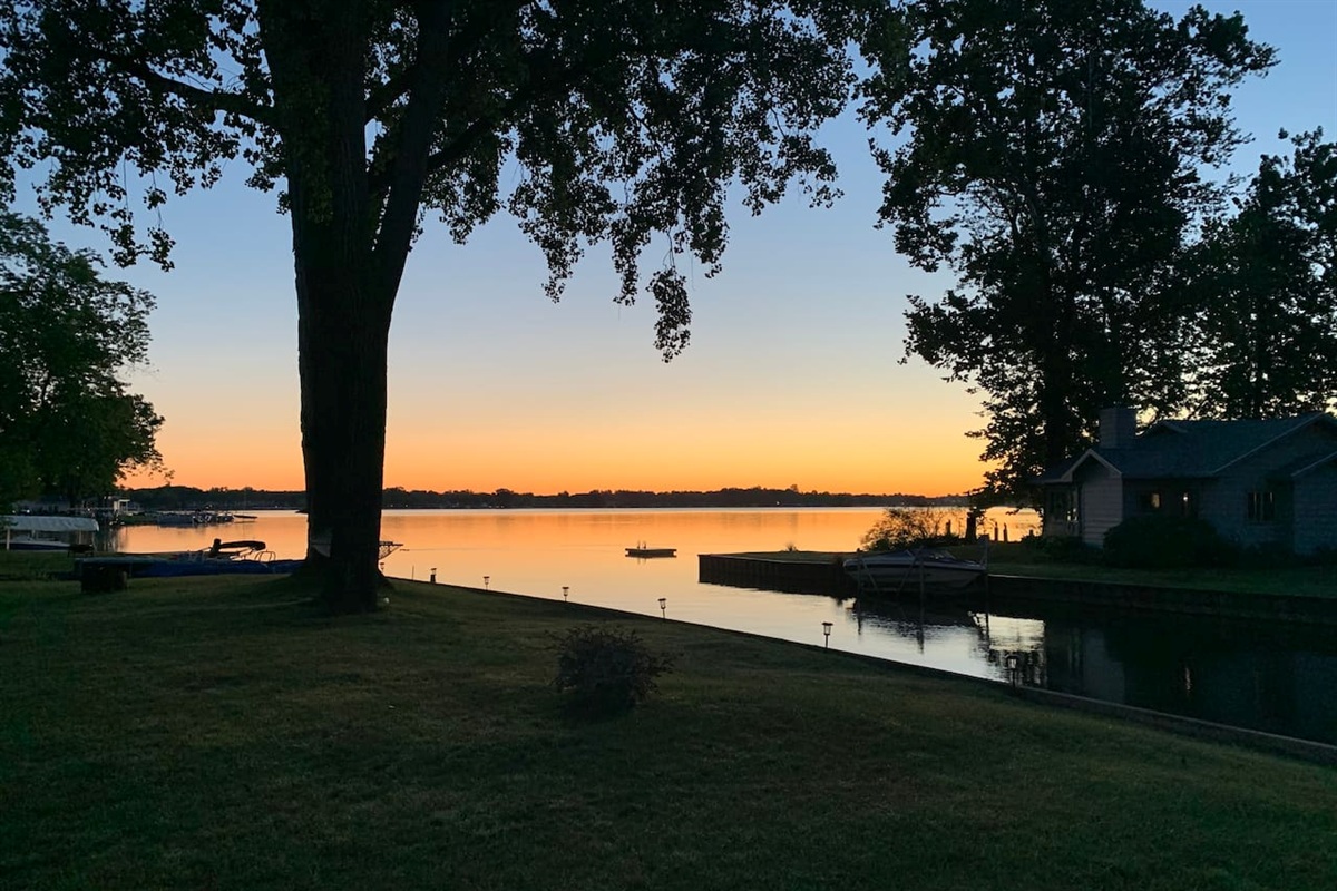 Beautiful Paw Paw Lake sunset just steps from the property.
