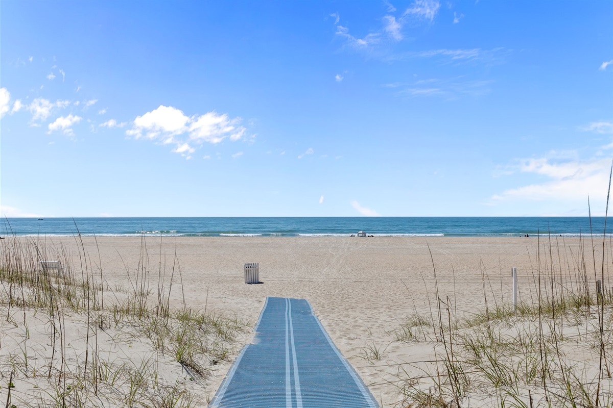Direct beach access leading to wide sandy beaches and ocean views