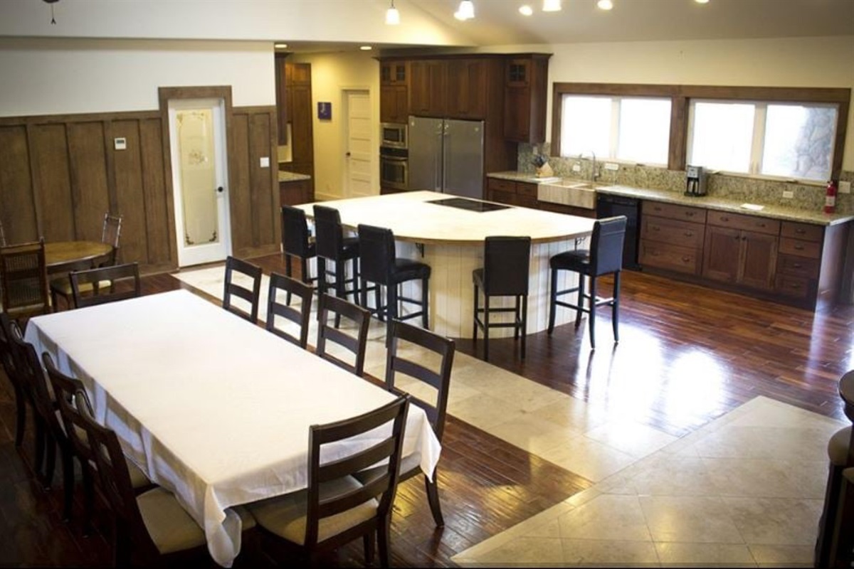 Kitchen/dining area with separate full-size refrigerator and freezer