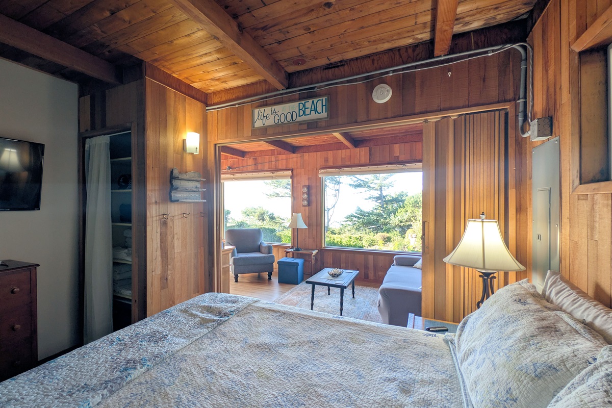 King Bedroom off of living room with Oak folding door