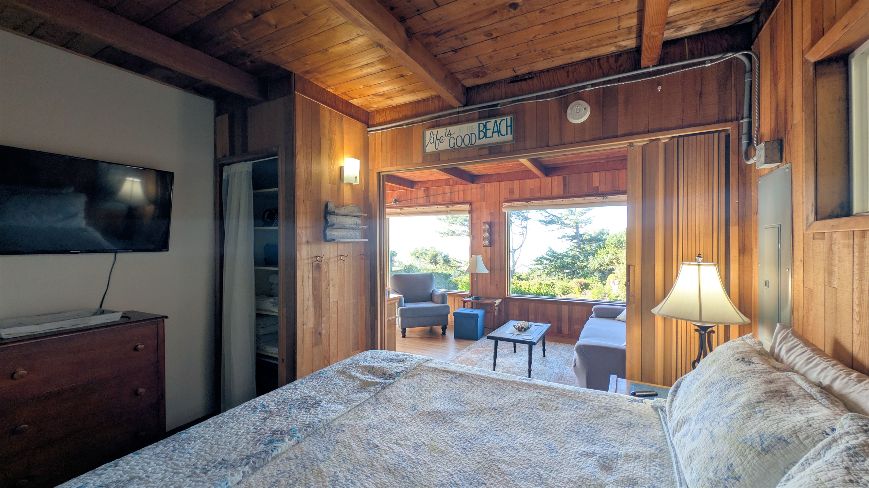 King Bedroom off of living room with Oak folding door