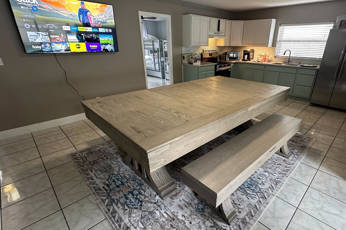 8' Slate Pool Table + Dining Combo Stylish wood table doubles as a full-size slate pool table with lavender felt—perfect for meals, games, and memory-making!