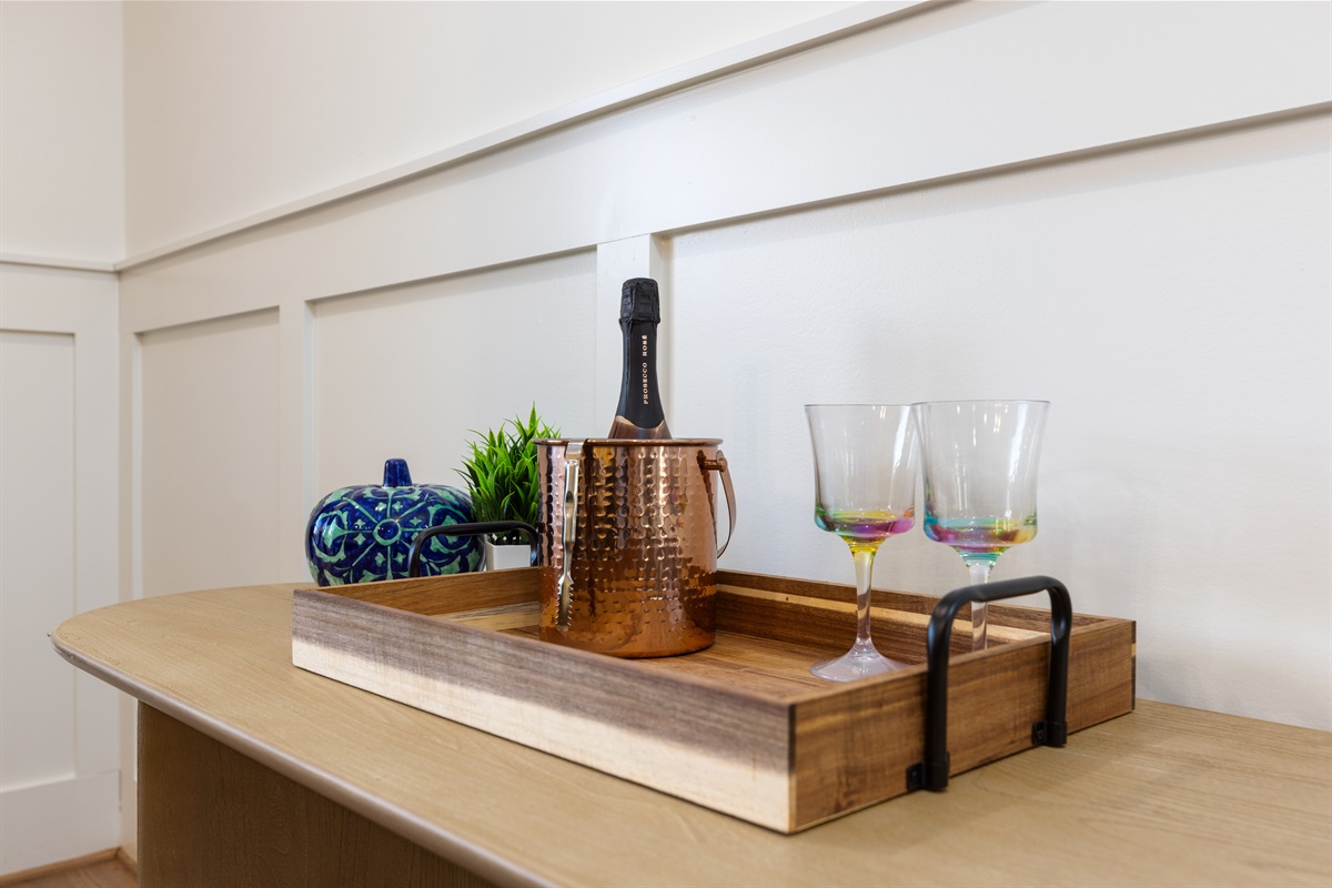 Make yourself a drink or setup a cocktail at the wet bar.