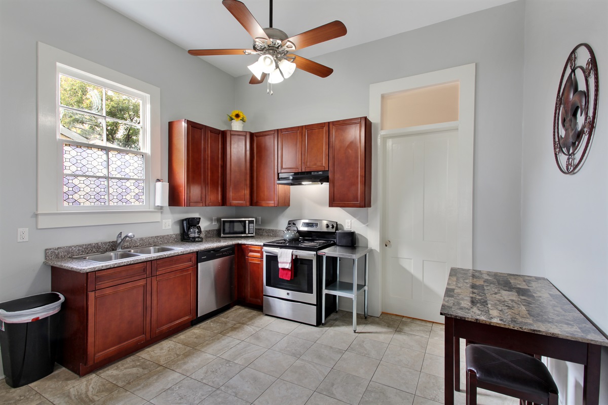 Full kitchen. Electric range, dishwasher, microwave, toaster, pots, pans, dishes, etc.