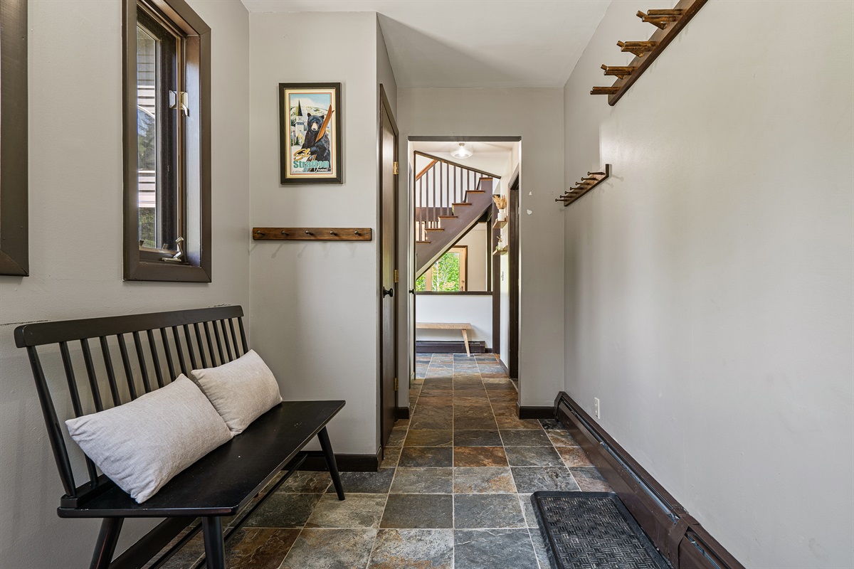 The convenient entry space offers plenty of room to store all your winter gear after a day on the slopes.