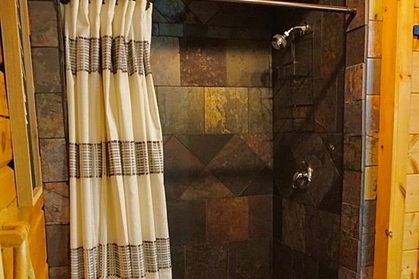 Experience the beauty of natural stone and modern amenities in your retreat!