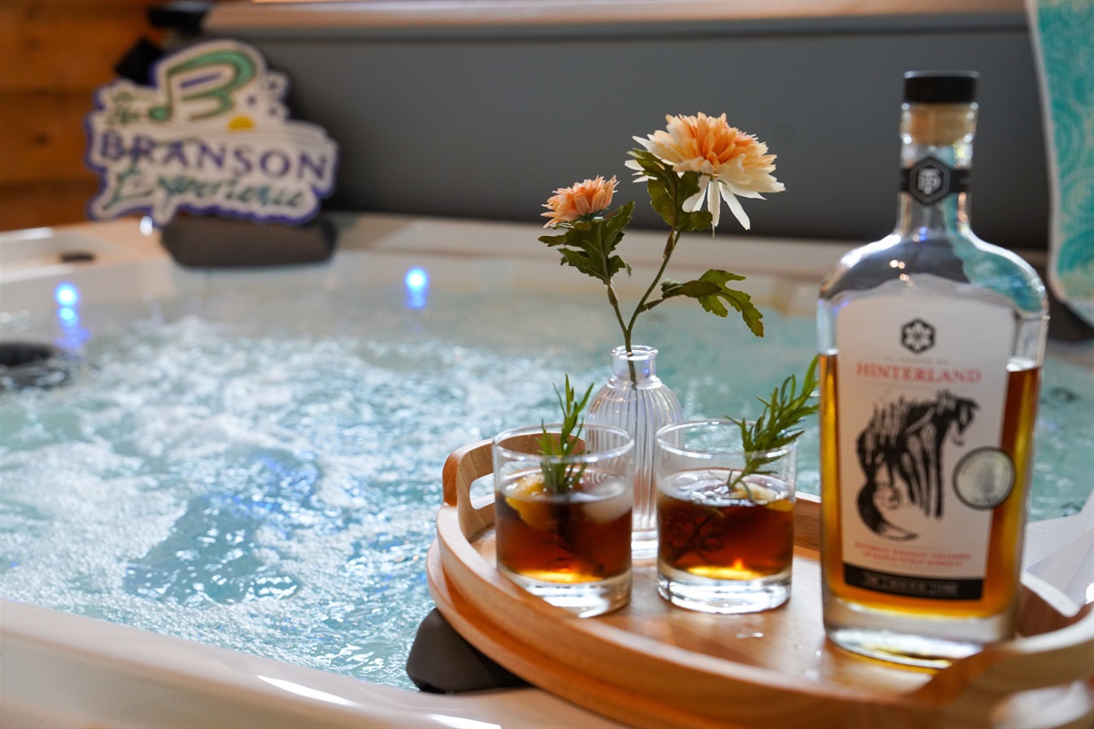 Enjoy a soak and a cocktail to relax at the end of a great day of adventure