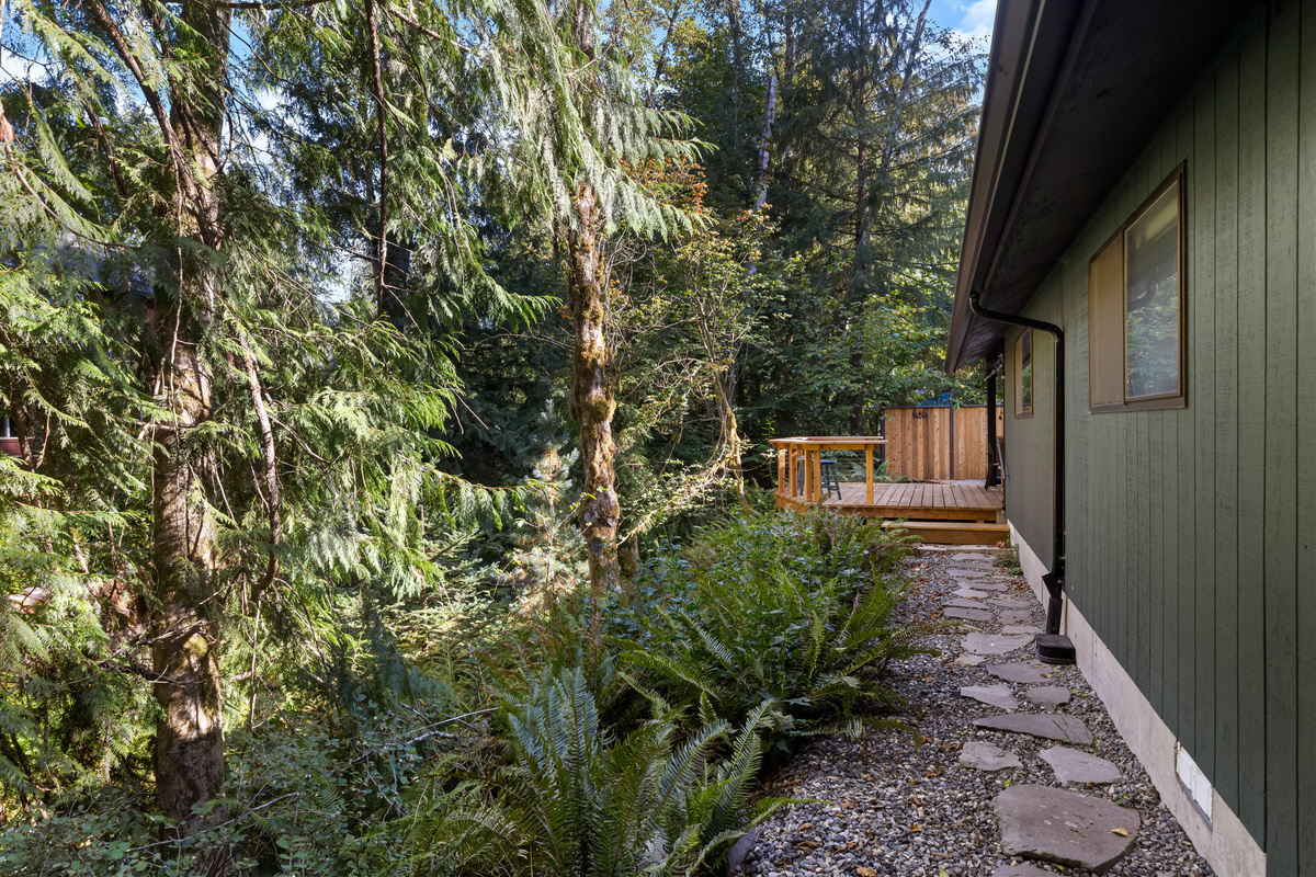 A stone path leads you straight from the carport to your private deck.