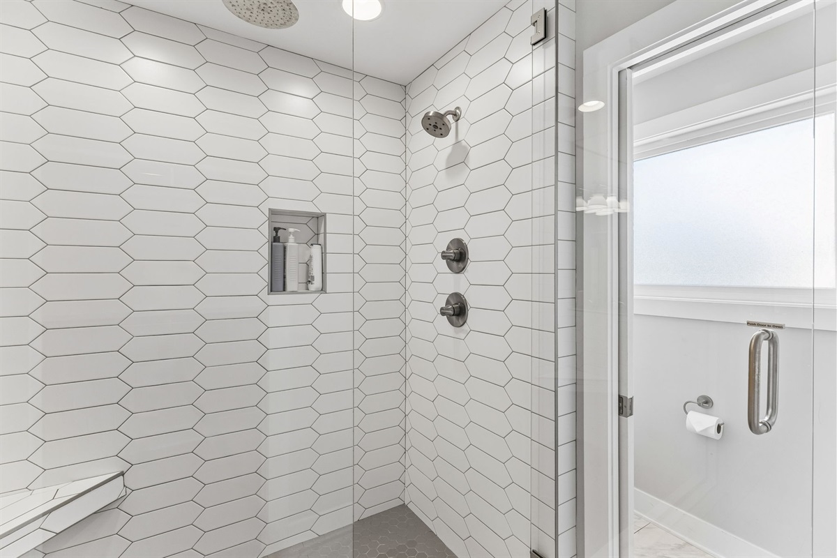 Share the master ensuite without the wait &mdash; double vanity, quartz counters, and enough mirror space so no one's elbowing anyone out of the way.