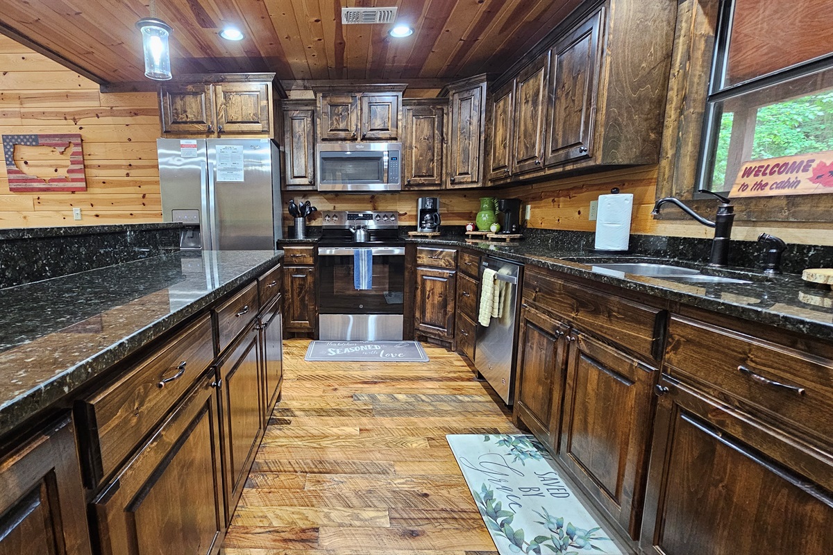 Kitchen: Rustic charm meets modern amenities in this chef's paradise, perfect for family feasts!