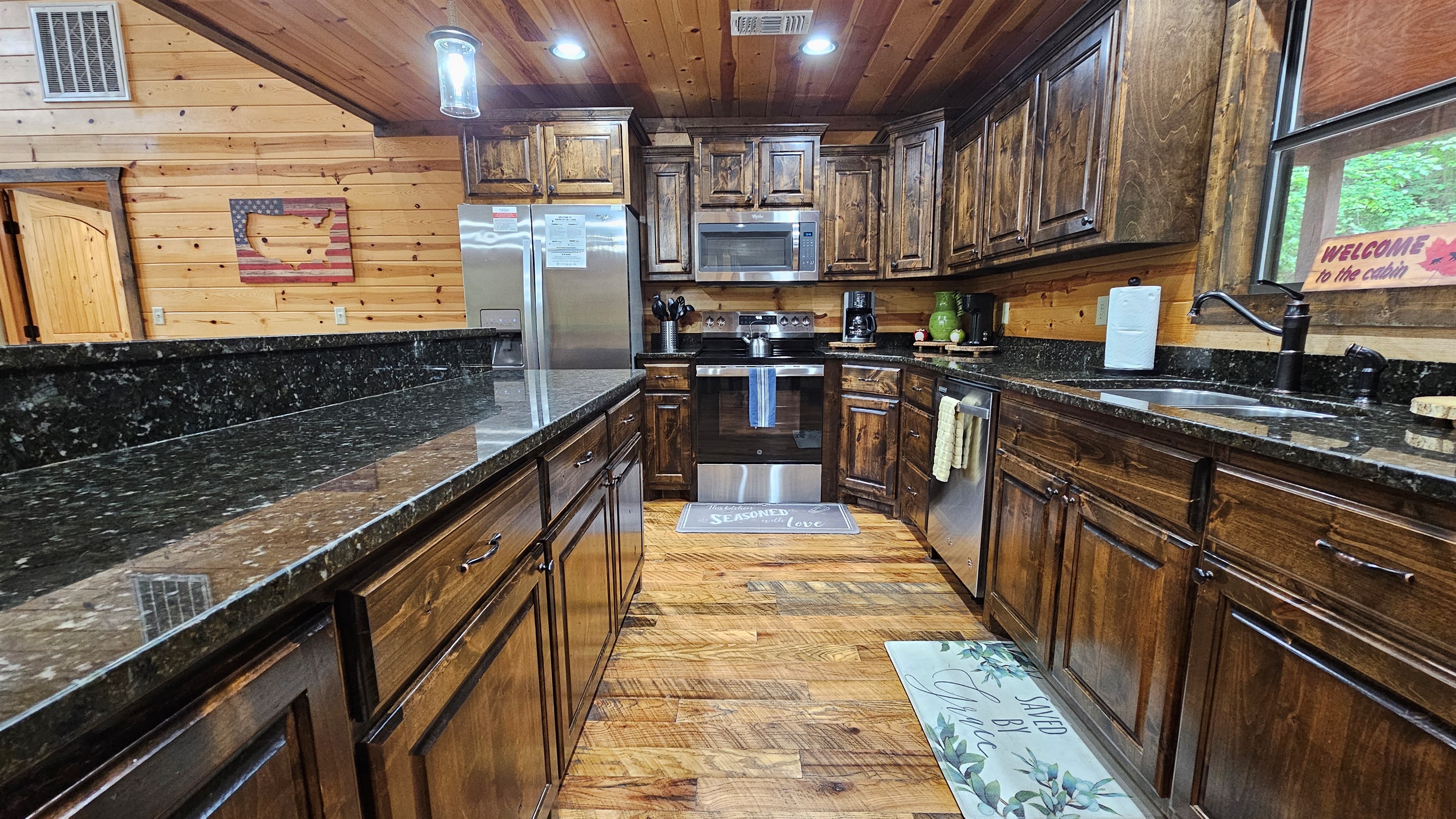 Kitchen: Rustic charm meets modern amenities in this chef's paradise, perfect for family feasts!