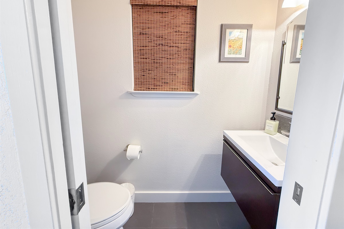 Half bathroom in the hallway