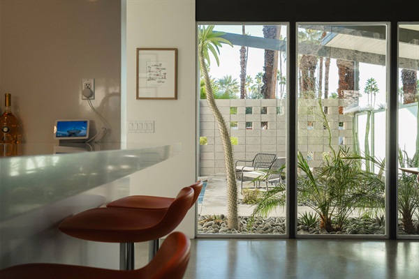 Windows to courtyard make this house so light and bright