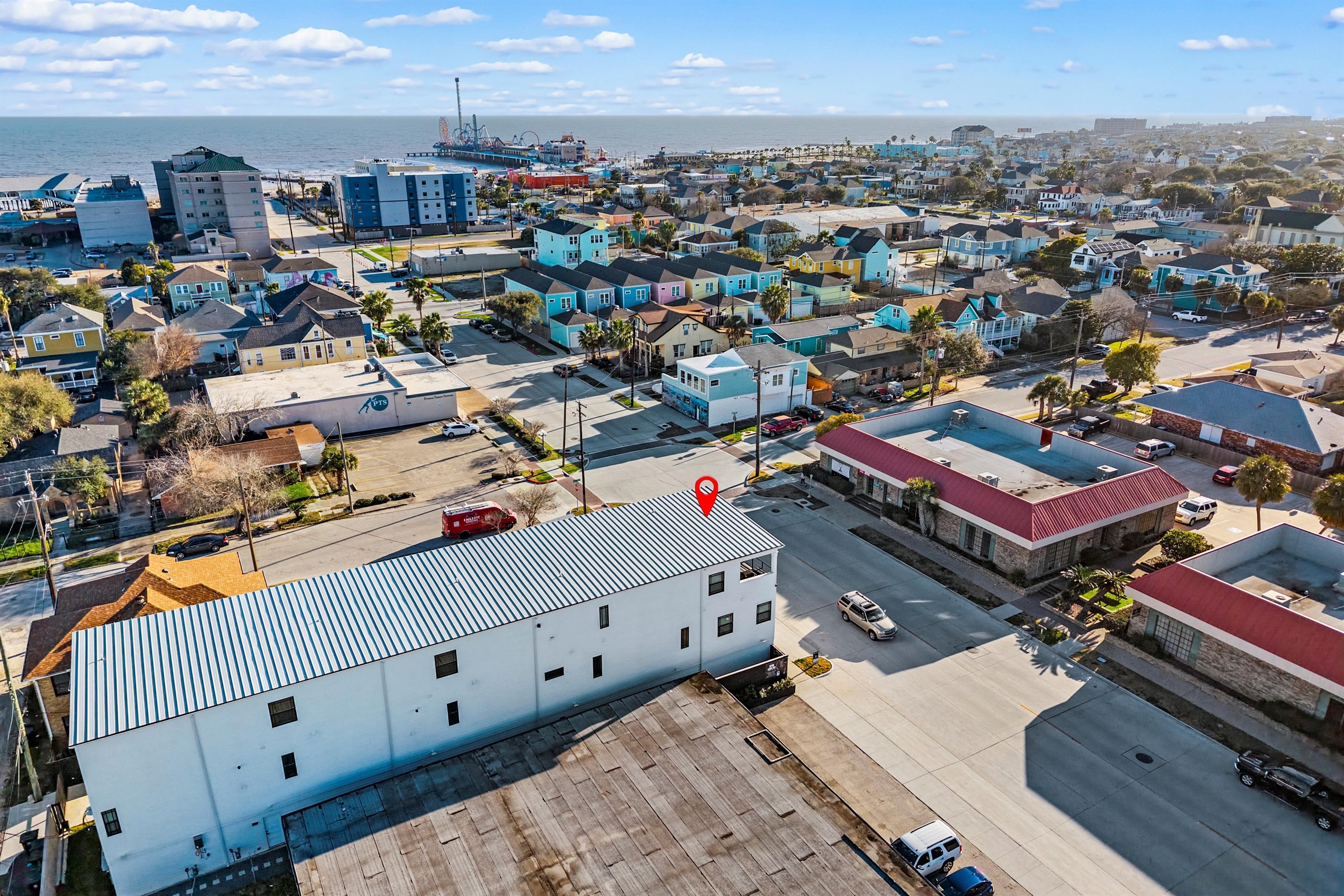 Exterior View: Vibrant coastal living just steps from the beach and pleasure pier fun!