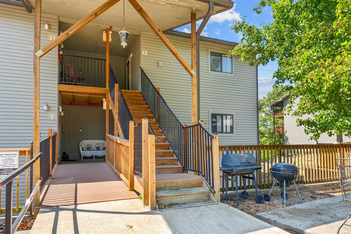 One flight of covered exterior stairs brings you up to this peaceful top-floor getaway.