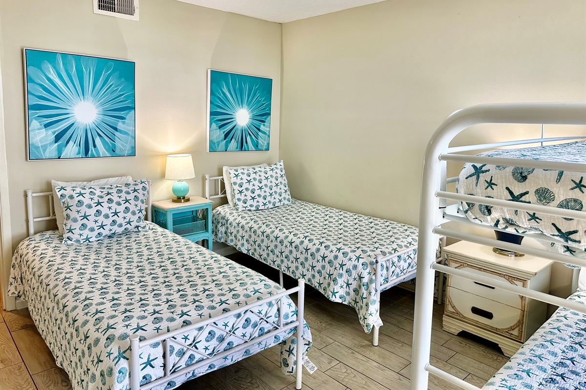 Very spacious guest bedroom...and so coastal!