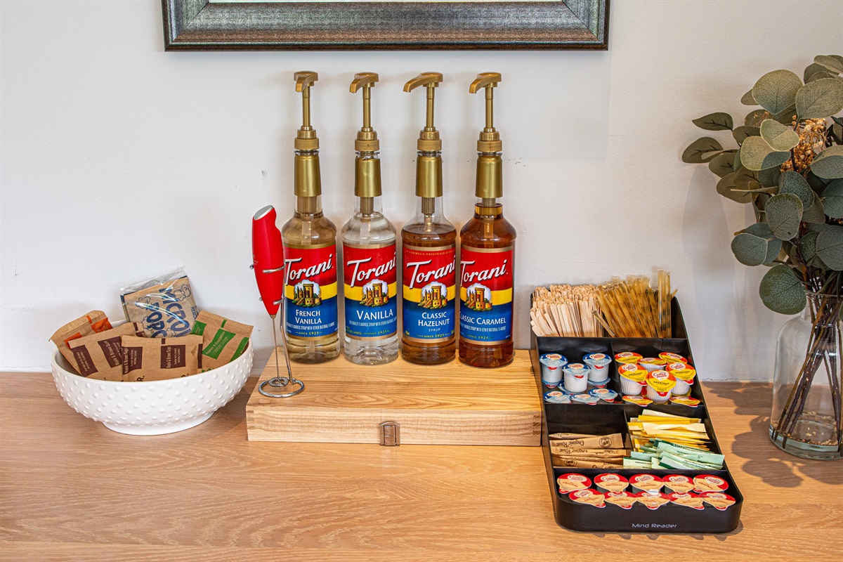 Craft your favorite coffee with delightful syrups and sweeteners at your fingertips!