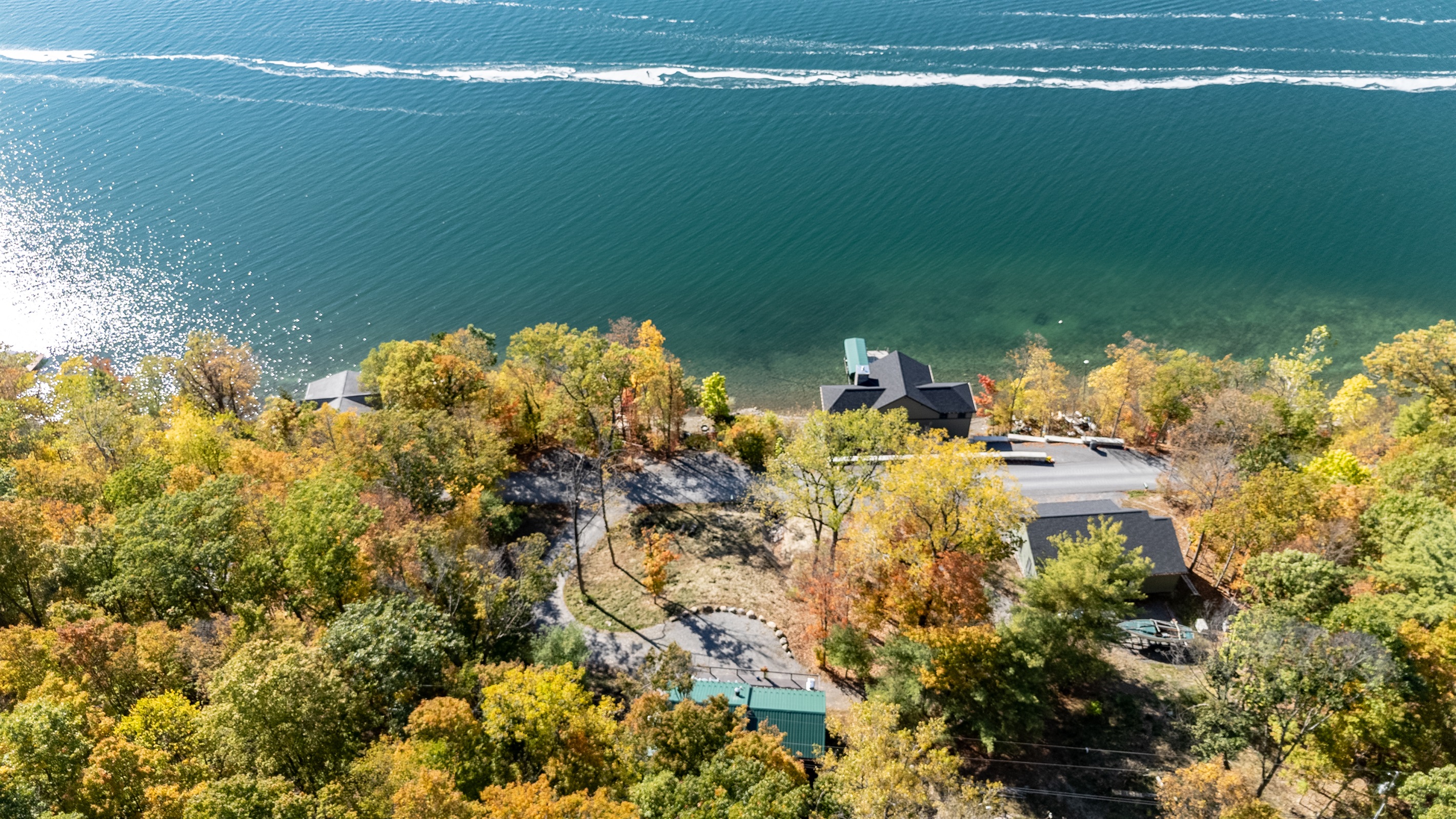 Closer view of the cabin with the lakefront setting — your Finger Lakes escape awaits.