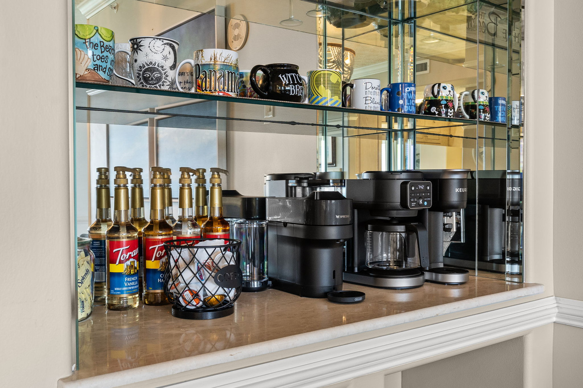 fully stocked coffee bar with keurig, Nespresso, drip coffee and flavorings