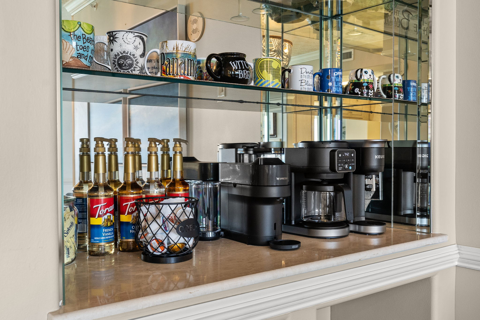 fully stocked coffee bar with keurig, Nespresso, drip coffee and flavorings