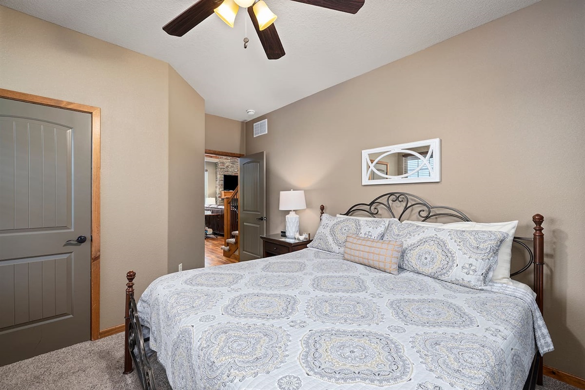 Main level king bedroom with bathroom right outside door