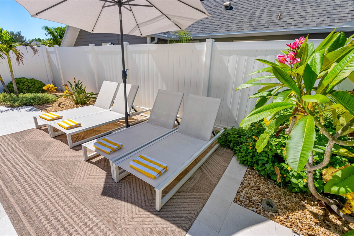 Lounge poolside with a cold drink, fire up the grill, or gather around the outdoor dining table with your crew.